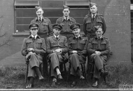 ROYAL AIR FORCE BOMBER COMMAND, 1942-1945. (HU 92988) The Acting Commanding Officer of No. 44 Squadron RAF, Squadron Leader J D Nettleton (sitting, second from left) and his crew, photographed on their return to Waddington, Lincolnshire, after leading the low-level daylight attack on the M.A.N. diesel engineering works at Augsburg on 17 April 1942. For his courage and leadership during the raid Nettleton was gazetted for the award of the Victoria Cro... Copyright: © IWM. Original Source: http://www.iwm.org.uk/collections/item/object/205127125